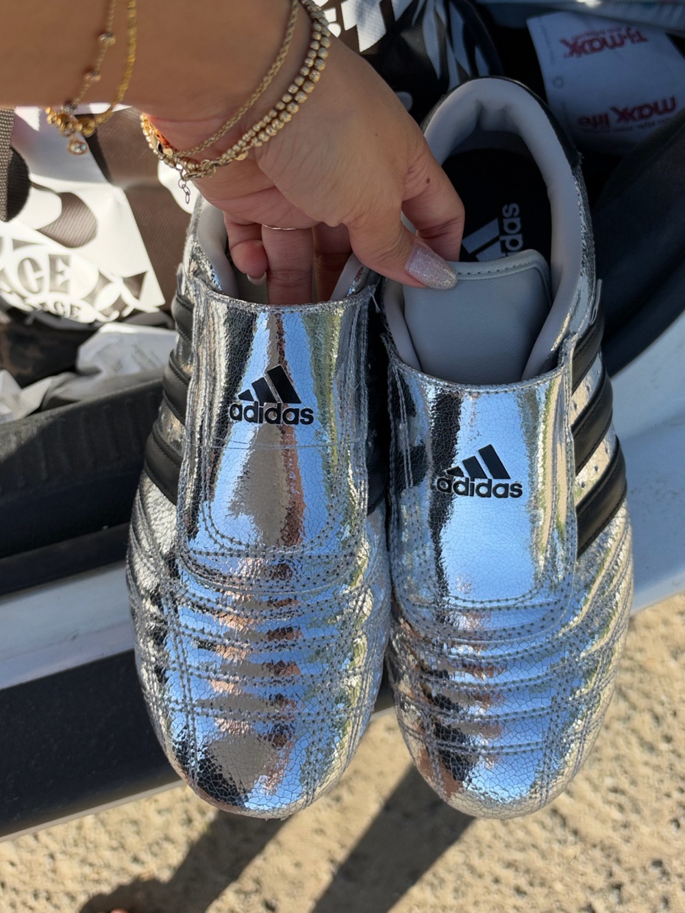 adidas Women's Silver Metallic Slip-On Sneakers with Black Stripes